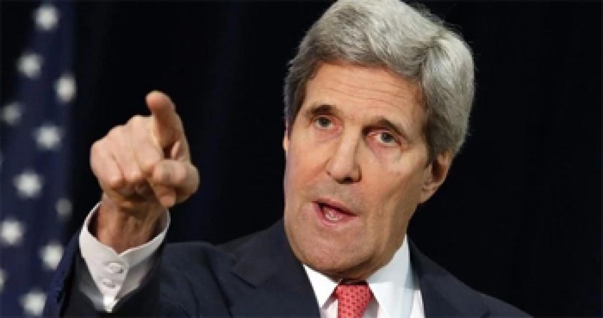 Kerry visits Baghdad to support Iraqi leaders